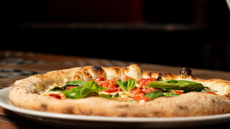 Classic Margherita pizza with fresh mozzarella and basil