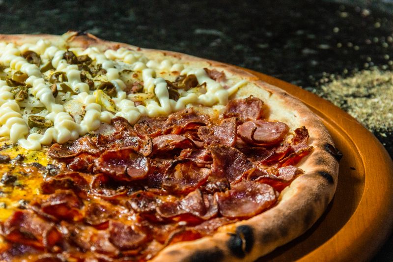 Spicy pepperoni pizza fresh from the oven at Pizza inn